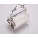 Silver-plated tennis themed biscuit tin
