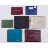 Seven cricket autograph books