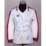 Emlyn Hughes a white, red and blue No.6 England autographed training shirt, 1979