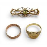 A 9ct gold peridot brooch, a faux coin ring, size P, wedding ring size P, weight all together 6.3gms