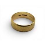 A 9ct gold wide wedding ring, size X, weight 5.5gms Condition Report:Available upon request