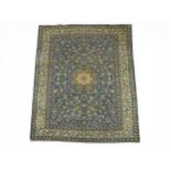 A LIGHT BLUE GROUND FINE PILE KASHAN RUG with dark blue and cream sunburst central medallion on