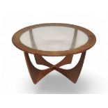 A MID 20TH CENTURY TEAK G PLAN "ASTRO" COFFEE TABLE  circular top with inset glass top on crossed