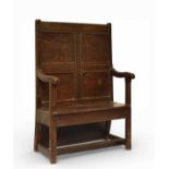 A 17th century oak settle