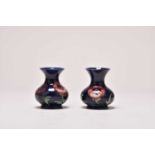 A pair of small William Moorcroft 'Big Poppy' vases