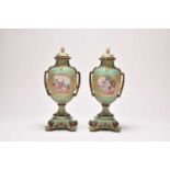 A pair of French vases and covers, 18th century, in the Chelsea-style