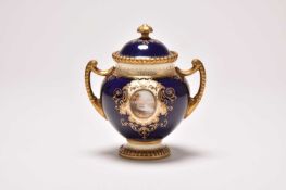 A small Coalport landscape pot pourri vase and cover by Edward Oakes Ball, circa 1920