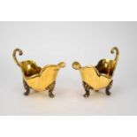 A pair of William IV silver gilt sauceboats