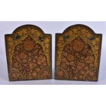 A PAIR OF ANTIQUE PERSIAN QAJAR LACQUER BOOKENDS. 14 cm x 10 cm.