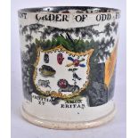 AN ANTIQUE ODD FELLOWS POTTERY MUG. 12.5 cm wide.