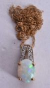 9ct gold synthetic opal diamond pendant necklace (2.1g). Chain 45 cm long, pendant 1.5 cm x 0.75