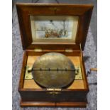 AN ANTIQUE WIND UP MUSIC BOX. 48 cm x 38 cm x 26 cm.