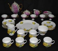 A Royal Kent tea service together with another continental tea service largest plate 26cm (36).