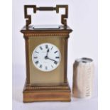 A GIANT LATE 19TH CENTURY FRENCH GILT CASED STRIKING CARRIAGE CLOCK the glazed case with reeded
