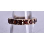 9ct gold garnet full eternity ring (2.4g). I.