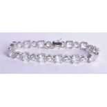 A SILVER TENNIS BRACELET. 29 grams. 20 cm long.