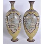 A PAIR OF LATE 19TH CENTURY JAPANESE MEIJI PERIOD CLOISONNE ENAMEL VASES. 25 cm high.