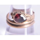 9ct gold antique garnet snake ring. (2.3g). O.
