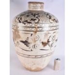 A LARGE CHINESE QING DYNASTY CHIZOU POTTERY FLOOR VASE painted with flowers. 68 cm x 42 cm.