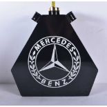 A metal enamelled Mercedes oil can 34 x 32cm