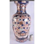 A VERY LARGE 19TH CENTURY JAPANESE MEIJI PERIOD IMARI PORCELAIN VASE painted with flowers, gardens