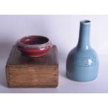 A CHINESE QING DYNASTY FLAMBE GLAZED PORCELAIN BRUSH WASHER together with a monochrome mallet