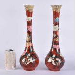 A LARGE PAIR OF LATE 19TH CENTURY JAPANESE MEIJI PERIOD SATSUMA VASES painted with birds on a