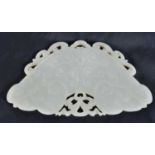 A CHINESE QING DYNASTY CARVED GREENISH WHITE JADE PLAQUE. 17 cm x 9 cm.