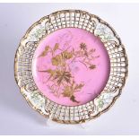 Late 19th century Spode Copeland China pink ground plate with raised gilded foliage, the border