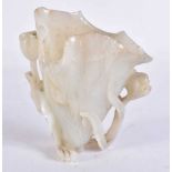 AN 19TH/19TH CENTURY CHINESE GREENISH WHITE JADE LIBATION CUP Qing, formed as a flower. 11 cm x 8.