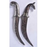 A Middle Eastern Dagger with sheath and Rams head handle together with another Dagger 30cm (2)