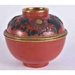 A FINE 18TH CENTURY JAPANESE EDO PERIOD RED LACQUER BOWL AND COVER decorated in relief with foliage.