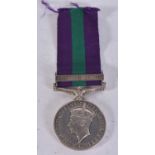 A WWII PALESTINE MEDAL presented to 1556 B Const P W Gandy Pal Police.