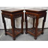 A FINE PAIR OF 18TH CENTURY CHINESE CARVED HUANGHUALI WOOD STANDS Qing. 77 cm x 44 cm.