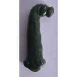 A 19TH CENTURY INDIAN MUGHAL SPINACH JADE DAGGER HANDLE formed as a horses head. 12.5 cm long.