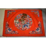 A 19TH CENTURY CHINESE SILK EMBROIDERED BUDDHISTIC LION PANEL Qing. 86 cm x 66 cm.