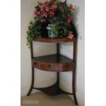 AN EDWARDIAN MAHOGANY PLANT STAND. 106 cm x 56 cm.
