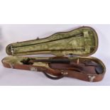 A CASED VIOLIN with two bows. Violin 59.5 cm long, length of back excluding hump 36.5 cm. (3)