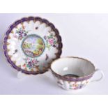 Worcester teacup and saucer painted with a landscape to each, the ground painted with flowers,