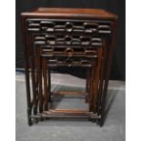 A LOVELY NEST OF FOUR 19TH CENTURY CHINESE HUANGHUALI TABLES Qing. Largest 72 cm x 48 cm x 36 cm. (