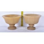 A pair of Chinese carved horn cups 8 x 10cm (2)