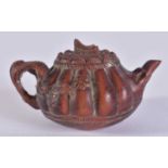 .A CARVED WOOD TEA POT. 4 x 7.3 x 4.8 cm.