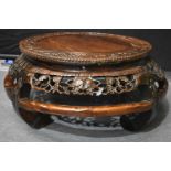 A FINE AND UNUSUAL 19TH CENTURY CHINESE CARVED HUANGHUALI TABLE Qing. 35cm High x 79cm Diameter.