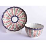 18th century Worcester teabowl and saucer painted with the Hop Trellis pattern having over-glaze