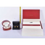 A cased set of Ian Flaherty of London Cufflinks together with another pair of cufflinks and a