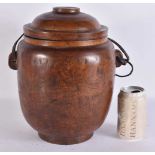 A LARGE 18TH/19TH CENTURY CHINESE CARVED WOOD JAR AND COVER Qing, possibly huanghuali. 32 cm x