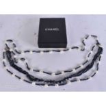 A BOXED CHANEL NECKLACE. 50 cm long.
