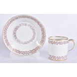 A 19TH CENTURY FRENCH SEVRES PORCELAIN CUP AND SAUCER painted with motifs. 11.5 cm wide. (2)