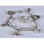 Sterling Silver Tiffany & Co Charm Bracelet by Elsa Peretti together with a Tiffany & Co Paloma