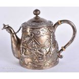 A 19TH CENTURY JAPANESE MEIJI PERIOD SILVER (TESTED) DRAGON TEAPOT. 375 grams, 15.5 cm wide.